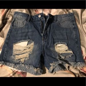 NWOT - Blue denim, distressed, high waisted shorts.
